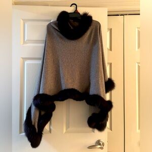 Poncho with fox fur